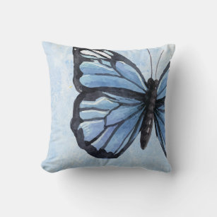 Coussin papillon bleu élégant