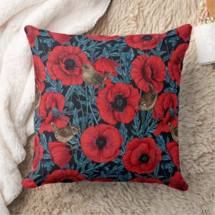 Coussin Pavot rouge et brunes, feuilles bleus sur noir