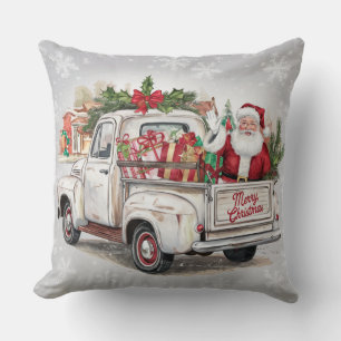 Coussin Père Noël et cadeaux dans un Camion rustique Noël