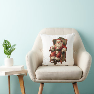 Coussin Père Noël vintage assis dans un fauteuil confortab