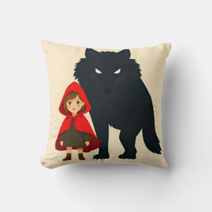 Coussin Personnage à capuche rouge face à un loup majestue