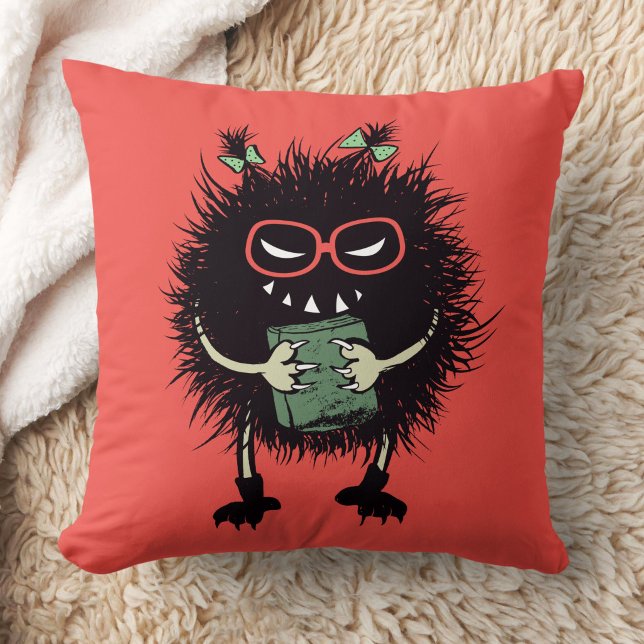 Coussin Personnage de l'amant du livre malin - Lecture Edg (orange red pillow with an evil character with eyeglasses and ponytails grinning and holding a book)