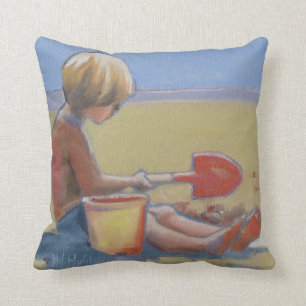 Coussin Petit garçon jouant dans le sable avec une pelle