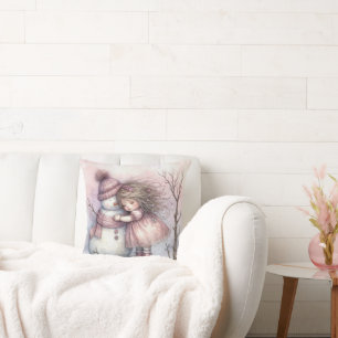 Coussin Petite fille serrant un bonhomme de neige