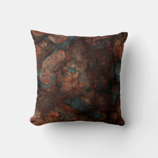 Coussin Pierre rouille et turquoise