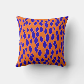 Coussin Plaques bleu foncé sur orange.