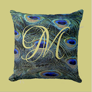 Coussin Plumes de paon colorées au monogramme doré élégant