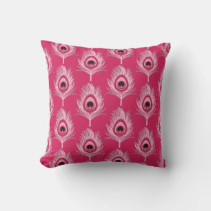 Coussin Plumes de paon, rose en pastel sur le rose fuchsia