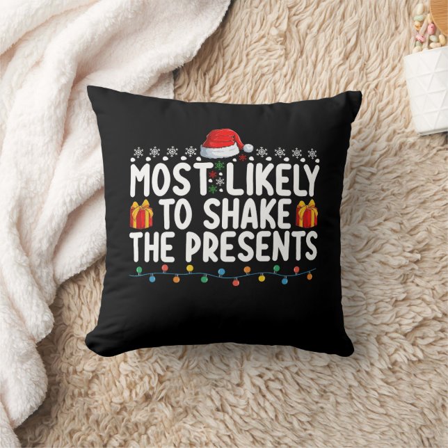 Coussin Plus susceptible de secouer les cadeaux de Noël (Couverture)