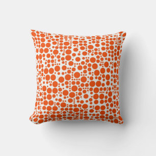 Coussin Points orange sur fond blanc