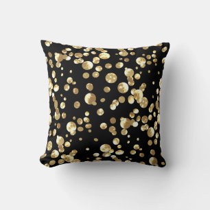 Coussin Pois or sur un arrière - plan noir.
