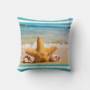 Coussin Poisson étoilé et coquillages sur la plage