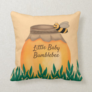 Coussin Pot de miel abeille bourdon sur une nurserie jaune