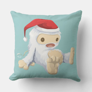 Coussin Poupée Yeti de Noël portant un chapeau de Père Noë