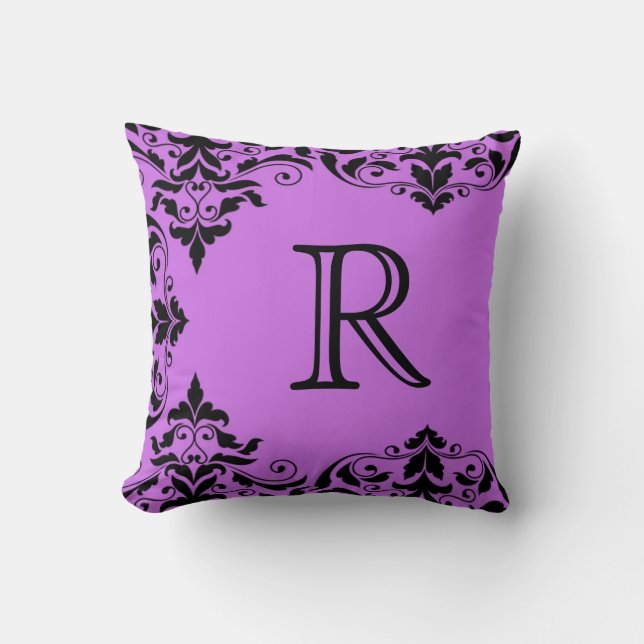 Coussin pourpre et noir de damassé de monogramme (Recto)
