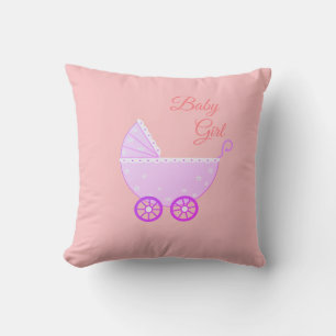 Coussin Poussette de bébé fille sur fond rose