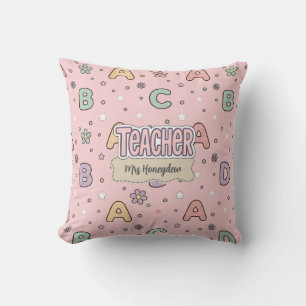 Coussin Professeur lettres roses motif scolaire