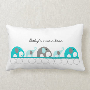 Coussin Rectangle Des éléphants turquoise en défilé + nom du bébé