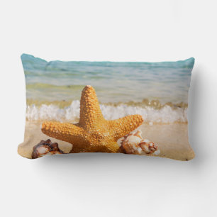 Coussin Rectangle Poisson étoilé et coquillages sur la plage
