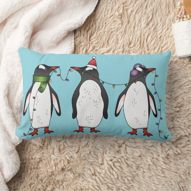 Coussin Rectangle Trois manchots de Noël festifs sur fond bleu clair (Couverture)