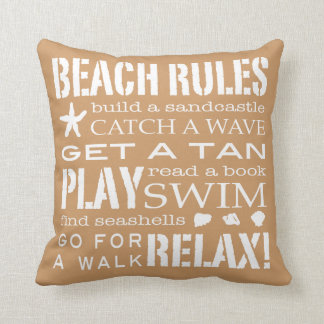 Coussin Règles de plage par le beige et le brun de sandy