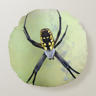 Coussin rond noir et jaune d'araignée de jardin