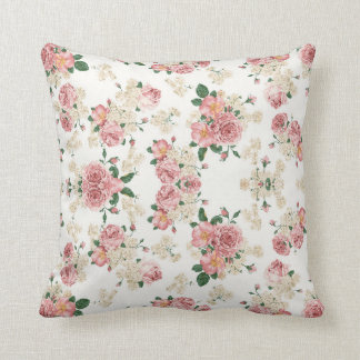 Coussin rose et blanc de motif de rose de cru
