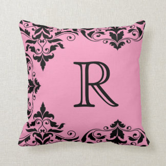 Coussin rose et noir de damassé de monogramme