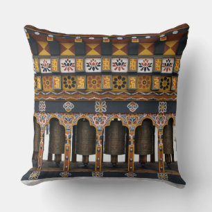 Coussin Roues de prière dans une petite place publique