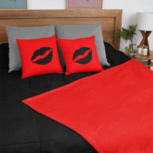 Coussin Rouge à lèvres noir sur rouge