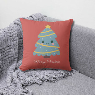 Coussin rouge avec un joli sapin de Noël