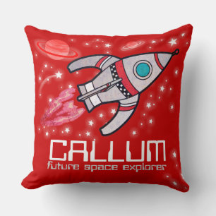 Coussin rouge de l'explorateur d'espace de fusée