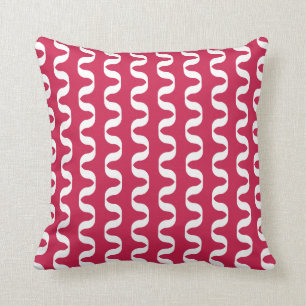 Coussin rouge de motif de torsion de rouge à