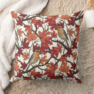 Coussin Rouges-gorges dans un érable sur fond blanc cassé