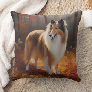 Coussin Rough Collie dans les feuilles d'automne qui tombe