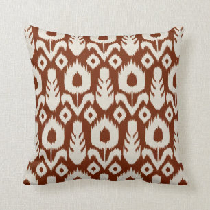 Coussin Rouille florale de motif d'Ikat rouge et naturelle