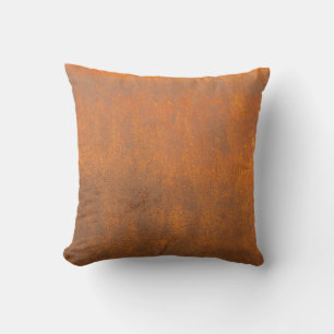 Coussin Rouille noire, texture métallique gros plan.