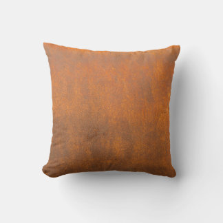 Coussin Rouille noire, texture métallique gros plan.