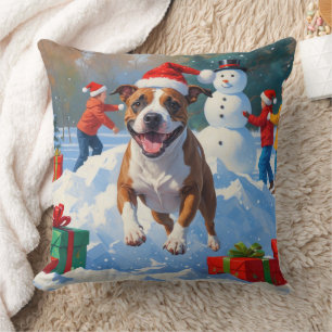 Coussin Scène de neige festive de Noël avec un Bull Terrie