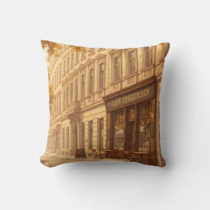 Coussin Scène de rue automnale avec des livres