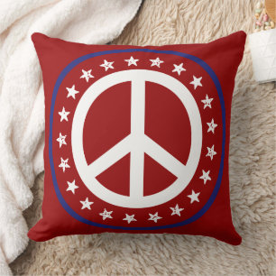Coussin Signe de paix et étoiles rouge, blanc et bleu mari