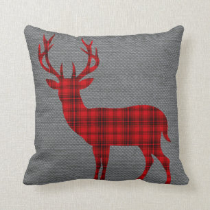 Coussin Silhouette de cerfs communs de plaid sur le rouge
