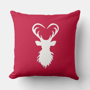 Coussin Silhouette de renne moderne sur fond rouge bordeau