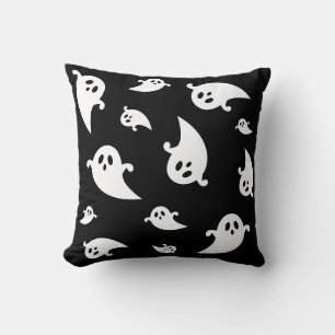 Coussin Silhouettes de fantômes blancs sur fond noir pour