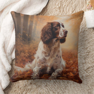 Coussin Springer Spaniel dans les feuilles d'automne qui t