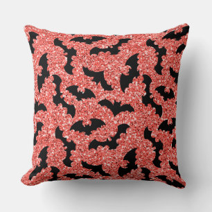 COUSSIN TENUE PAILLETÉE ROUGE AVEC CHAUVES-SOURIS NOIRES