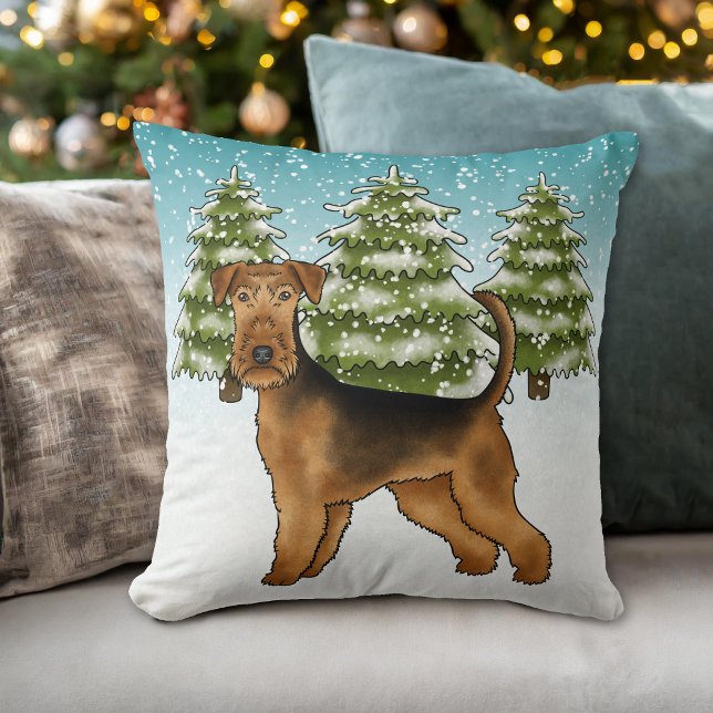 Coussin Tervueren Airedale dans une forêt enneigée en hive (Please note: This image is a digital mockup. The product may not be in scale.)