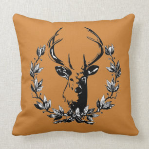 Coussin Tête de cerf rustique dans des feuilles de laurier