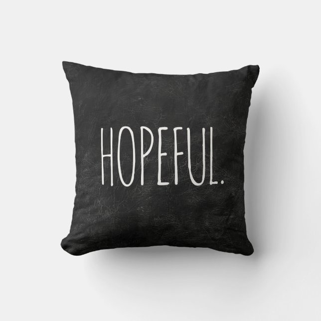 Coussin Texte HOPEUL sur cuir noir (Recto)