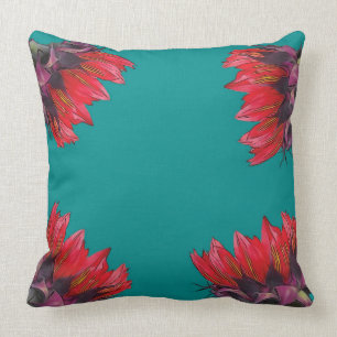 Coussin Tournesol rouge sur le carreau de turquoise